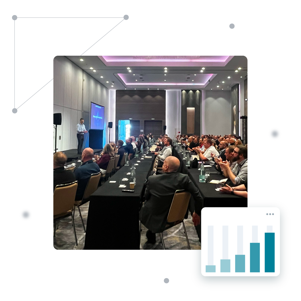 Group of employees in a Harris conference session.